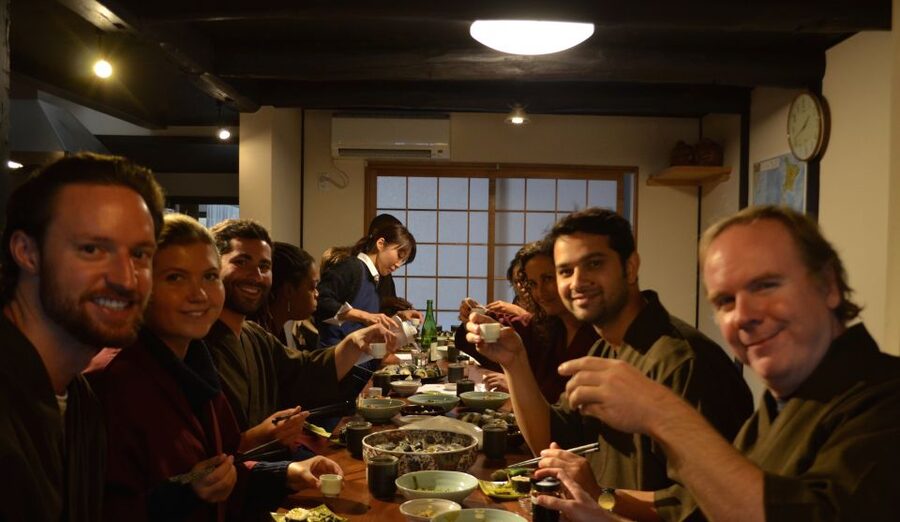 Kyoto: Afternoon Japanese Izakaya Cooking Class - Eating the first dishes before returning to the stove