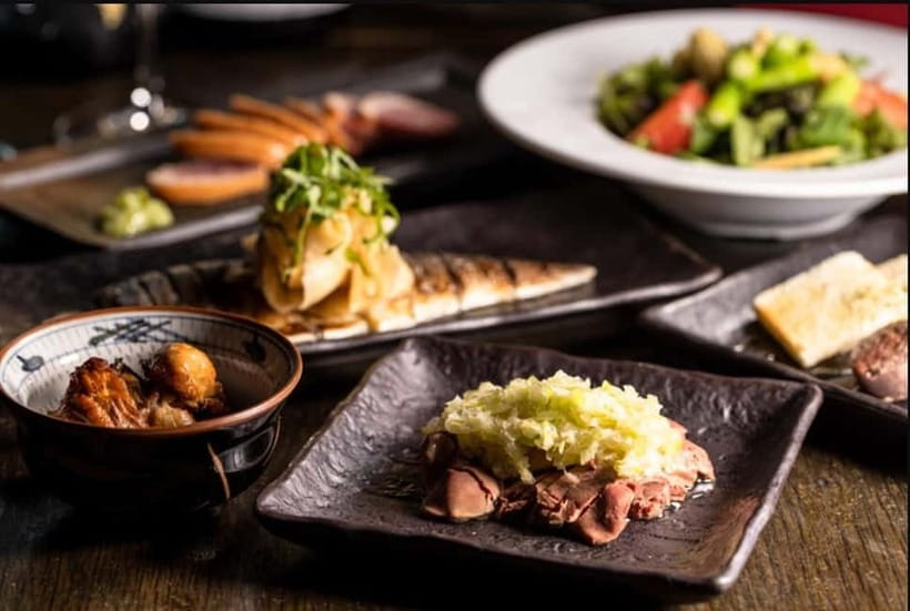 Tokyo: Izakaya Bar Experience at Kuuraku Ginza Reservation - Key points at a glance