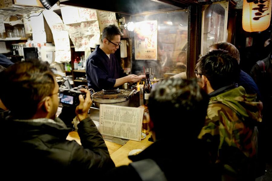 Tokyo: Shinjuku Izakaya Food&Drinking Tour (Local Guide) - Walking through Kabukicho under the neon