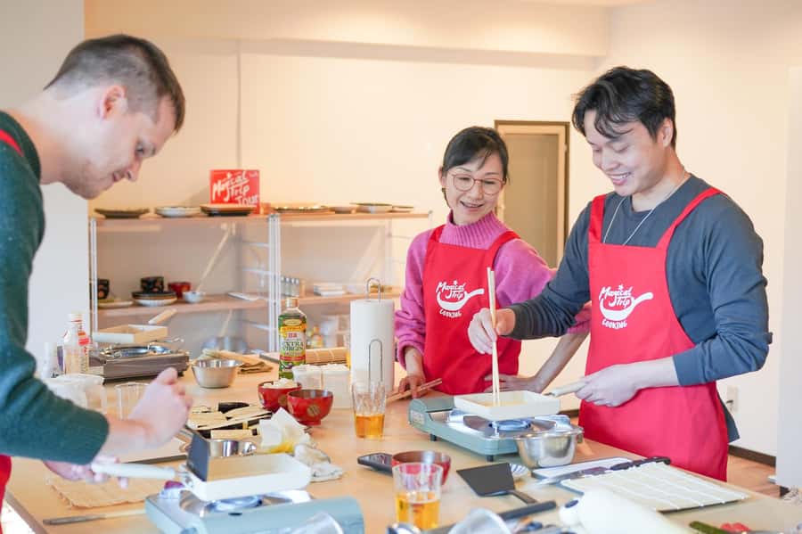 Tokyo: Sushi Cooking Class with Sake Tasting - Making sushi, soup, and home-style dishes