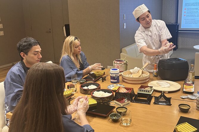 Tokyo Sushi Making Class : Sake Ceremony & Matcha Experience - Learning the basic shape of nigiri